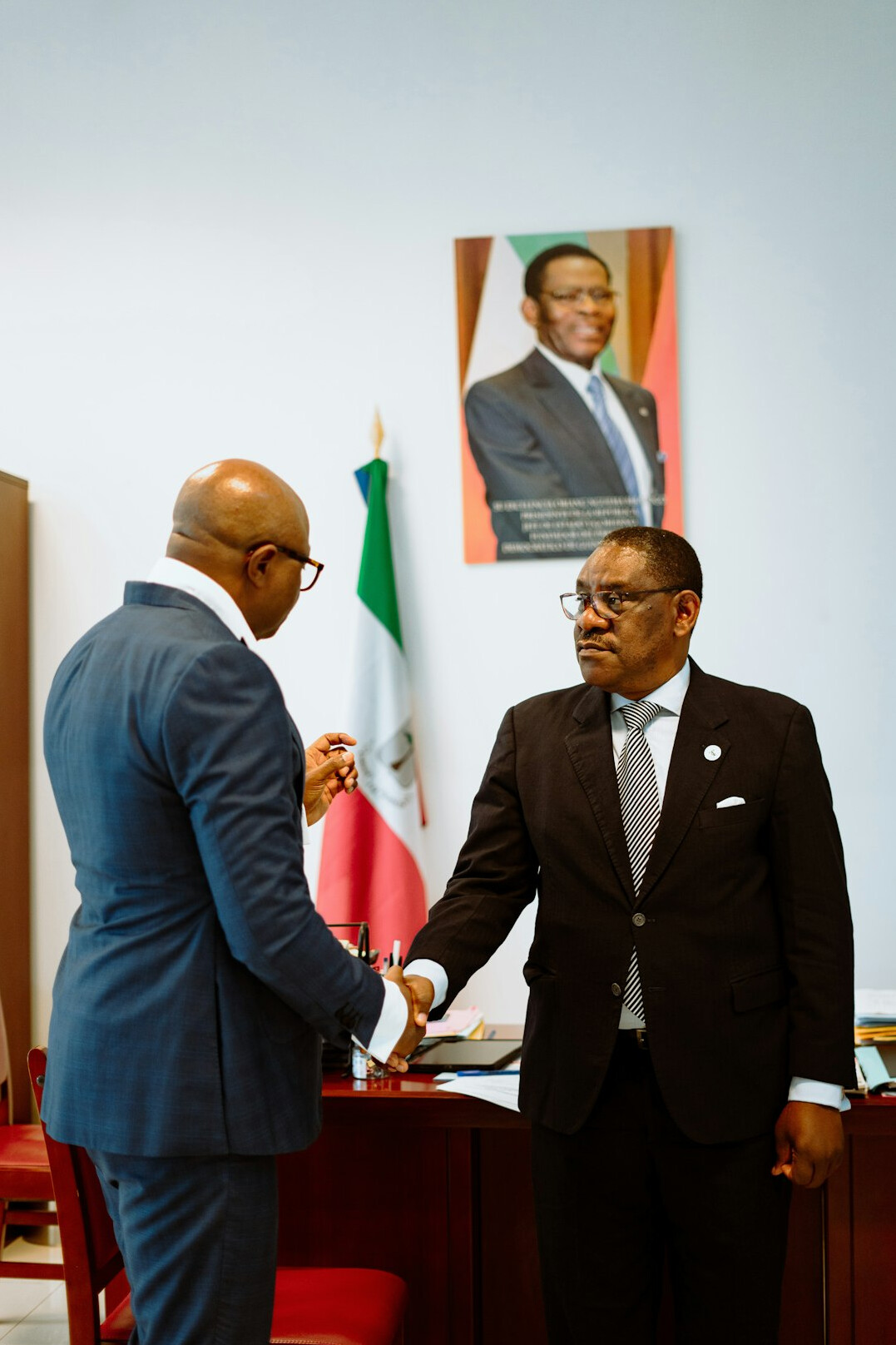 business handshake in office